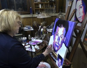 CARL RUSSO/Staff photoAnne Marie Zanfagna paints a portrait of heroin overdose victim Daniel Barnes. After losing her 25-year-old daughter, Jackie, to a heroin overdose, Zanfagna began painting these portraits to remember those who have been lost to the epidemic.